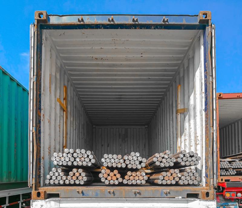 Bundled round steel bar prepared for truckload delivery